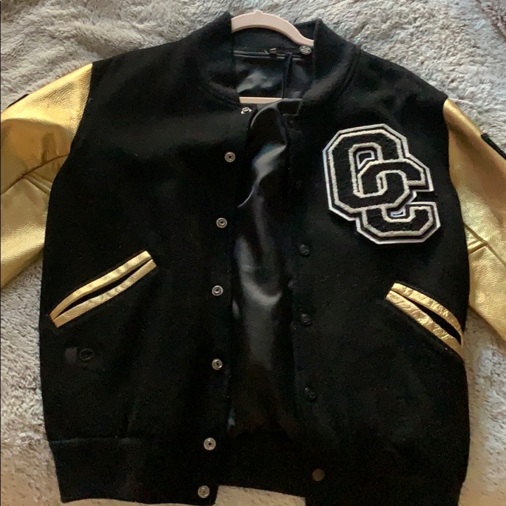 Open ceremony varsity jacket Seen on Beyoncé.